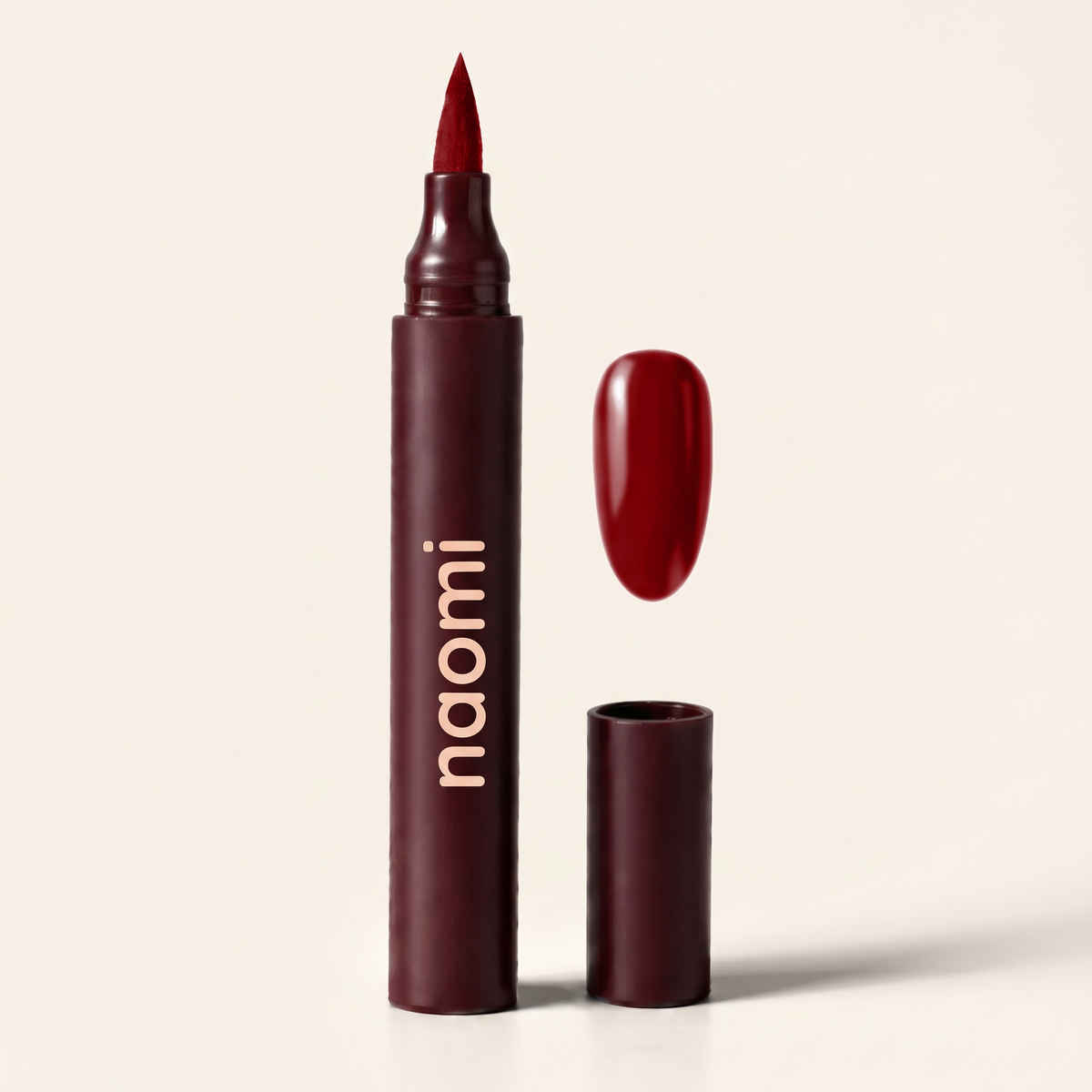 The Naomi Nail Pen in Burgundy with nail swatch