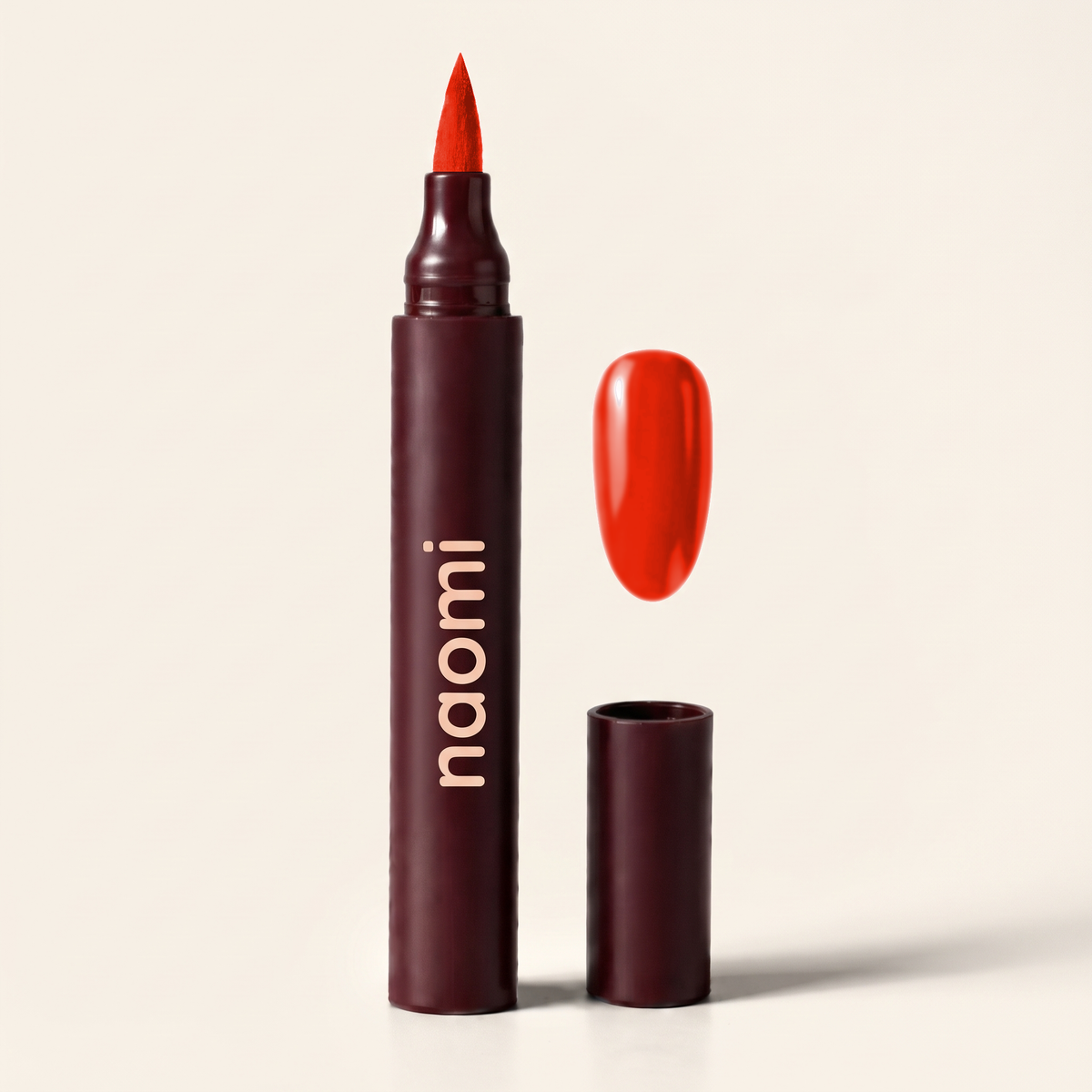 The Naomi Nail Pen in Orange Tomato